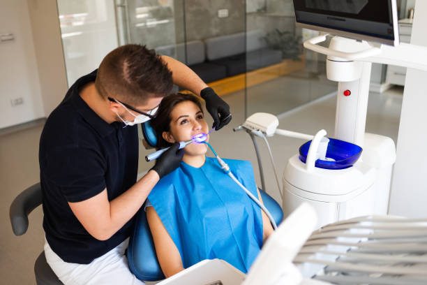 a dentist doing a dental cleaning